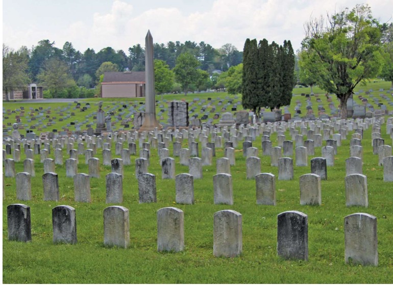 A number of headstones marking the unidentified interred at Grandview Cemetery.
