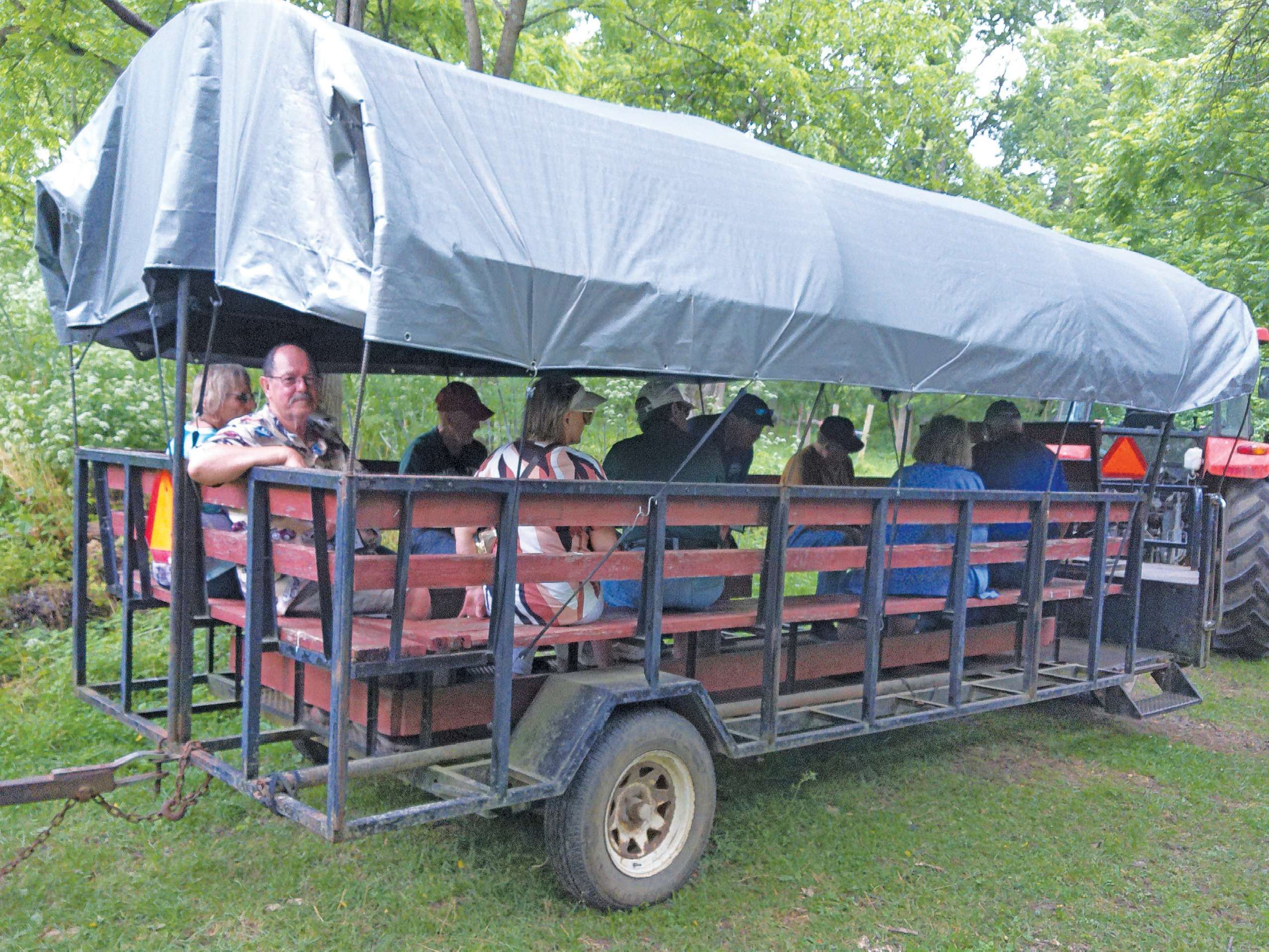 VMCCA members riding a hay wagon at Marmon Valley Farm