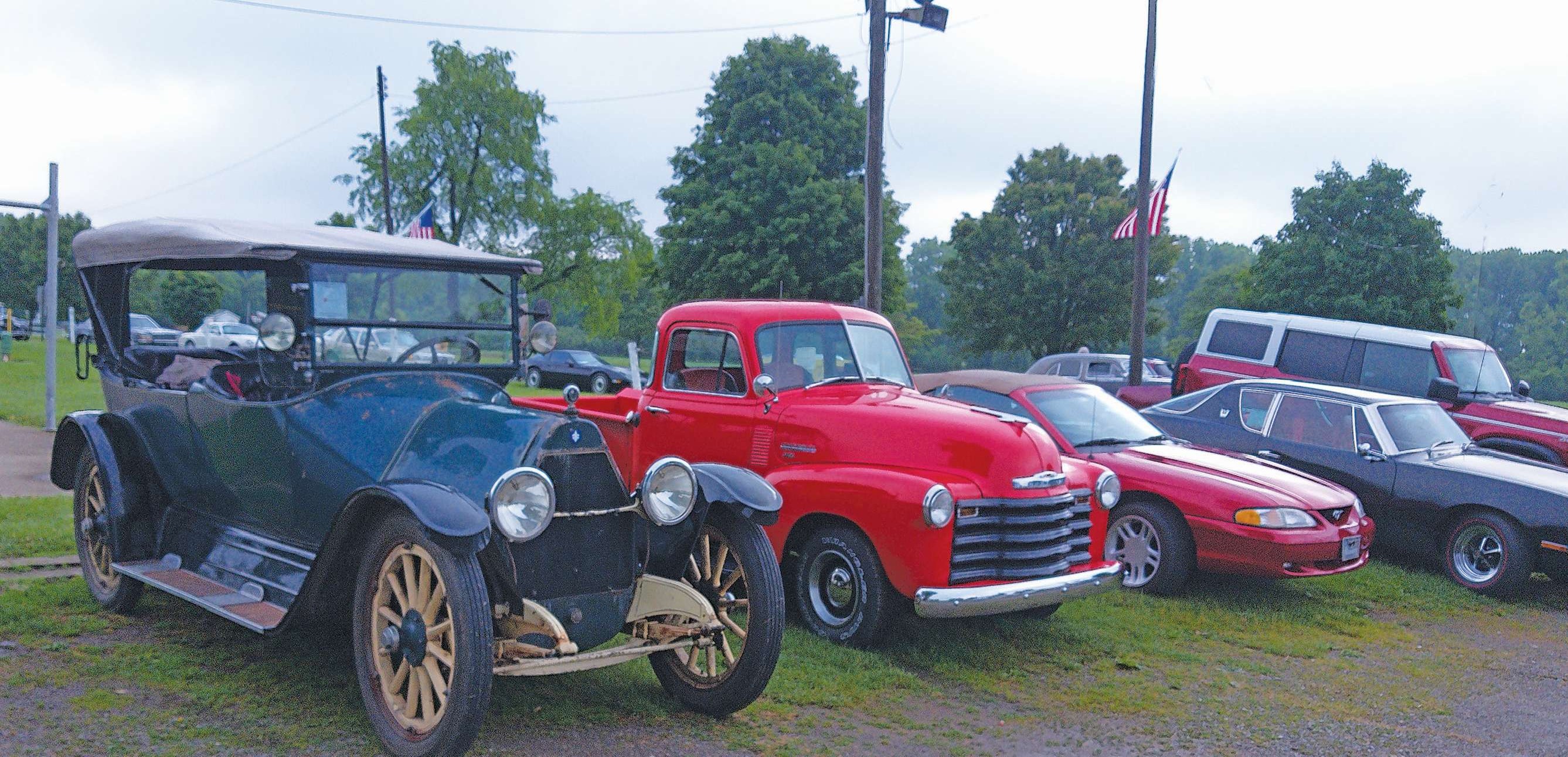 Four vintage vehicles on the Farm Boys Tour